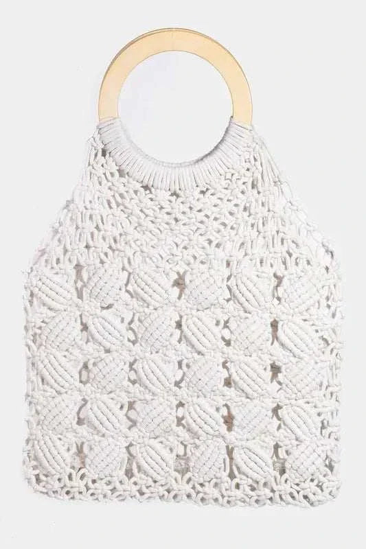 White handcrafted macrame Wood Handle Boho Bag with round wooden top handle and braided texture.
