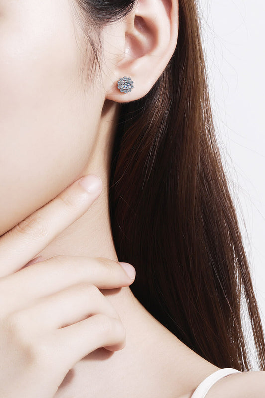 Close-up of unique crystal stud earrings showcased on a model's ear for elegant style