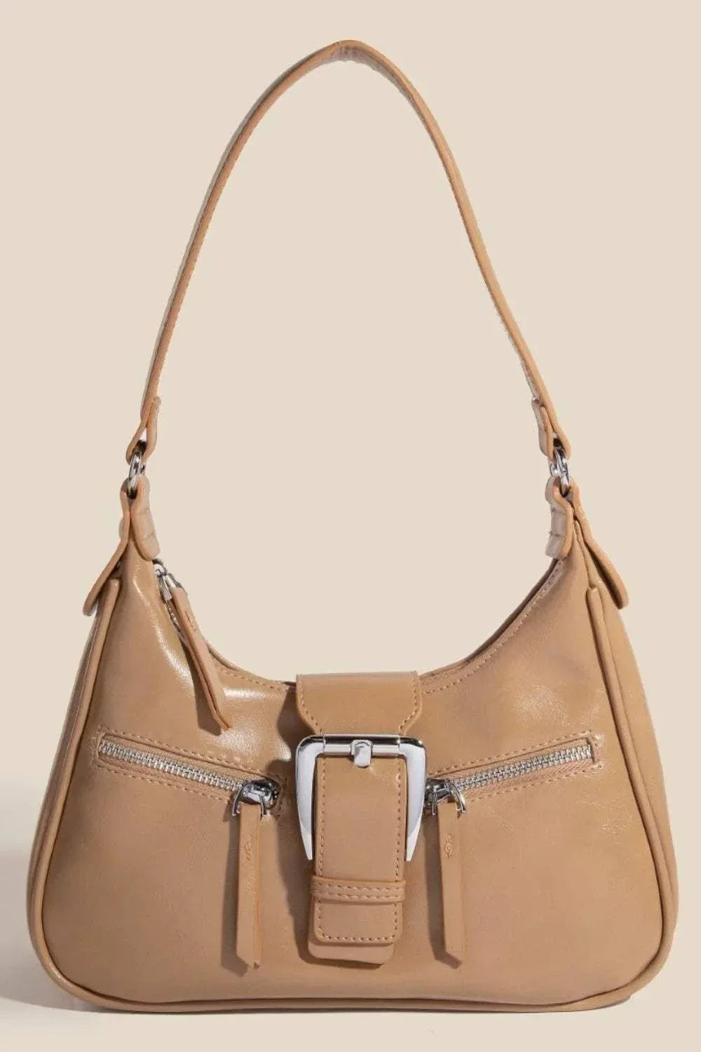 Tan Buckle Tote Bag with large buckle accent and triple zipper design for secure storage and everyday use