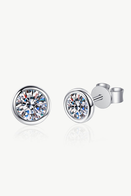 Elegant handcrafted moissanite earrings in silver, featuring brilliant round cut stones for a shimmering look